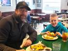 Father and son enjoying breakfast at The Canteen Restaurant in Barrington Father and son enjoying breakfast at The Canteen Restaurant in Barrington