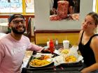 Couple enjoying lunch at Charcoal Flame Grill in Morton Grove Couple enjoying lunch at Charcoal Flame Grill in Morton Grove