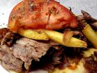 Homemade pork gyros at Charcoal Flame Grill in Morton Grove Homemade pork gyros at Charcoal Flame Grill in Morton Grove