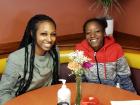 Sisters enjoying breakfast at Lumes Pancake House Chicago Sisters enjoying breakfast at Lumes Pancake House Chicago