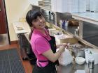 Friendly server with carryout order at Tasty Waffle Restaurant in Plainfield Friendly server with carryout order at Tasty Waffle Restaurant in Plainfield