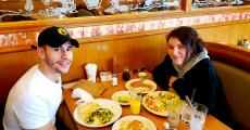 Couple enjoying breakfast at Apple Villa Pancake House in Hoffman Estates Couple enjoying breakfast at Apple Villa Pancake House in Hoffman Estates