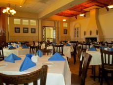 The cozy fireplace dining room at Athena Greek Restaurant in Chicago The cozy fireplace dining room at Athena Greek Restaurant in Chicago