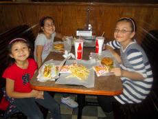 Girls enjoying burgers and hotdogs at Billy Boy's Restaurant in Chicago Ridge Girls enjoying burgers and hotdogs at Billy Boy's Restaurant in Chicago Ridge