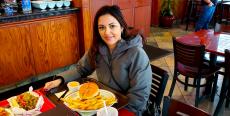Loyal customer enjoying lunch at Brandy's Gyros in Chicago Loyal customer enjoying lunch at Brandy's Gyros in Chicago