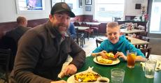 Father and Son enjoying lunch at The Canteen Restaurant in Barrington Father and Son enjoying lunch at The Canteen Restaurant in Barrington