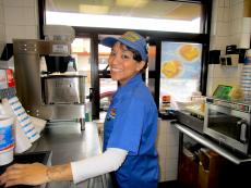 Friendly drive-thru worker at Charcoal Delights Restaurant in Des Plaines Friendly drive-thru worker at Charcoal Delights Restaurant in Des Plaines