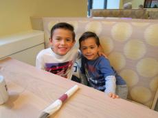 Brothers ready to enjoy breakfast with Mom at Eggs Inc. Cafe in Chicago Brothers ready to enjoy breakfast with Mom at Eggs Inc. Cafe in Chicago