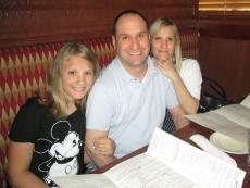 Family ready to order dinner at Jameson's Charhouse in Arlington Heights Family ready to order dinner at Jameson's Charhouse in Arlington Heights