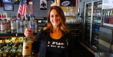 Friendly bar server at First Place Sports Bar & Grill in Hoffman Estates Friendly bar server at First Place Sports Bar & Grill in Hoffman Estates