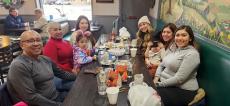 Family enjoying lunch at Les Brothers Restaurant in Oak Lawn Family enjoying lunch at Les Brothers Restaurant in Oak Lawn