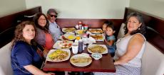 Family enjoying breakfast at Maple Butter Cafe in Plainfield Family enjoying breakfast at Maple Butter Cafe in Plainfield