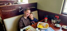 Mother and son enjoying breakfast at Maple Butter Cafe in Plainfield Mother and son enjoying breakfast at Maple Butter Cafe in Plainfield