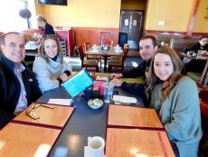Family enjoying lunch at Pomegranate Restaurant in Aurora Family enjoying lunch at Pomegranate Restaurant in Aurora