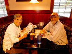 Couple enjoying dinner at Woodfire Tavern in Long Grove Couple enjoying dinner at Woodfire Tavern in Long Grove